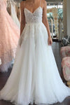A Line Spaghetti Straps V Neck Floor Ivory Tulle Beach Wedding Dress with Appliques